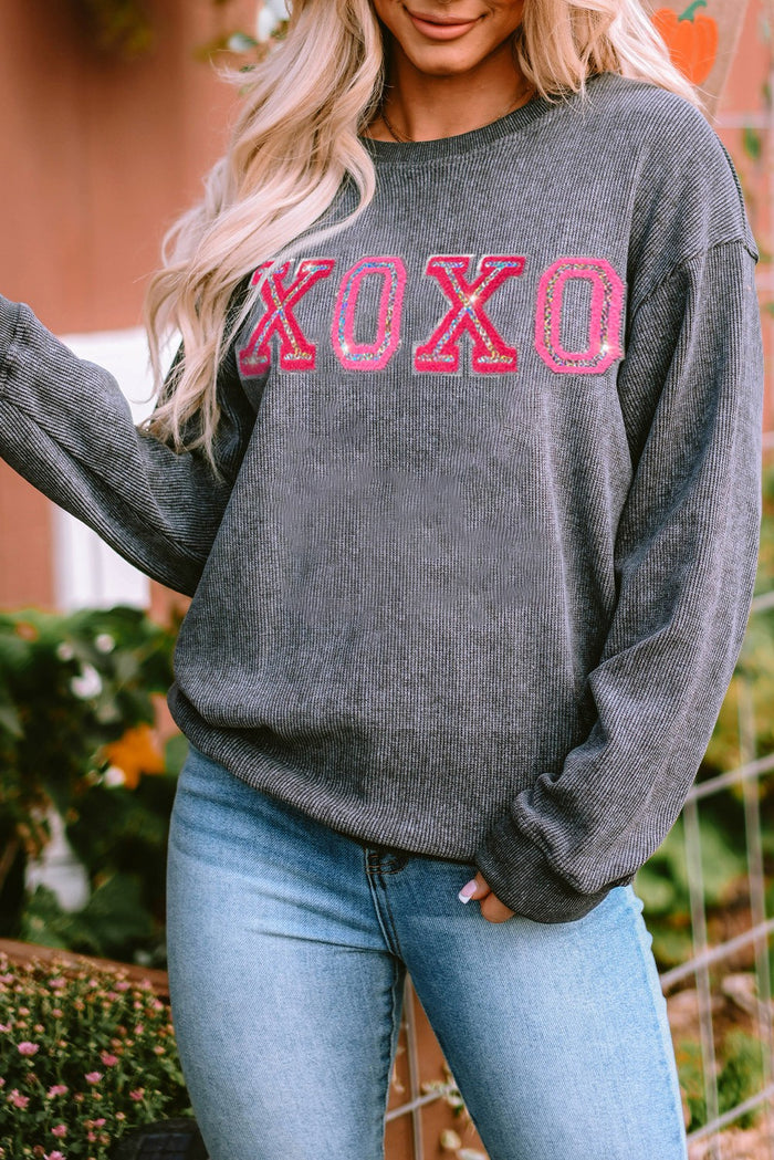 grey xoxo sweater